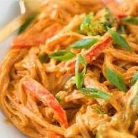 Curry Noodles · Spicy. Stir-fried small rice noodles mixed with eggs and green onions in a red coconut curry...