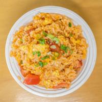 Tomato  Fried Rice · With peas, carrots, corn, and scallion.