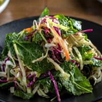 Cupitol Veggie · Baby kale, white and red cabbage, carrots, green onions and lemon vinaigrette.