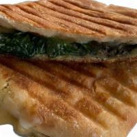 Vee Grilled Cheese · Ciabatta bread, spinach, cheese, pesto, and garlic.