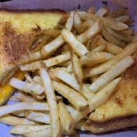 Grilled Cheese Sandwich · Your Choice of Wisconsin cheese served on a grilled thick-sliced Texas Toast with your choic...