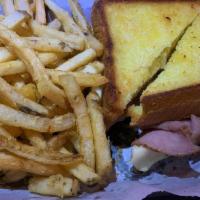 Grilled Ham And Cheese Sandwich · Shaved ham and your choice of cheese served on a grilled thick-sliced Texas Toast with your ...