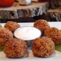 Not Your Kid'S Mac · Our amped up fried mac and cheese balls with a kick. served with a side of ranch