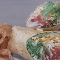 Deli Wrap · Fresh turkey breast or ham served cold with lettuce tomato and cheddar jack cheese