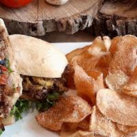 Chopped Cheese · A new york deli classic our 1/2 lb angus steak burger hashed and sautéed with onions and gre...