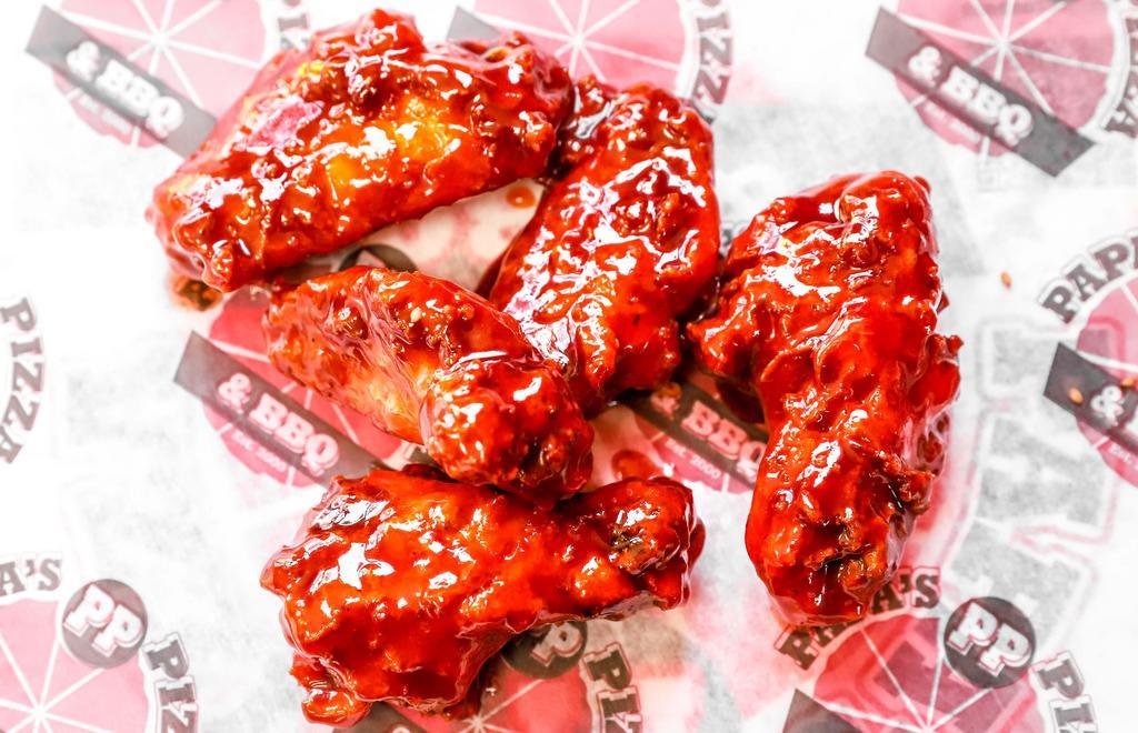 Wing Dings · Six wings served with BBQ sauce or ranch dressing.