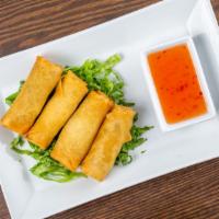 Veggie Egg Rolls · Crispy egg roll with sweet and sour sauce.