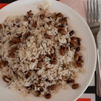 Red Rice & Beans · White rice w/ Black eye peas.