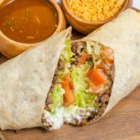 Burrito'S · Your choice of Meat. Served with Beans, Cheese, Lettuce, Tomato, and Sour Cream