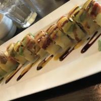 Mom'S · Deep fried soft shell crab, mango, cucumber,seaweed salad wrapped with soy paper, topped wit...