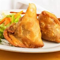 Samosa (2) (Vegetarian) · Fried snack with a savoury filling of spiced potatoes, onions, peas, served with house speci...