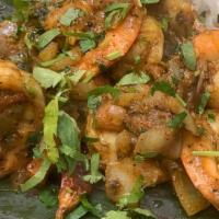 Shrimp Varuval · Shrimps cooked with Chef's special home made curry sauce along with fresh herbs.