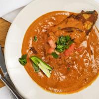 Fish Curry (Non-Vegetarian) · Marinated fish fillets cooked with tomato, onion, coconut milk and a variety of Indian spices.
