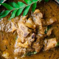 Goat Curry · Goat cooked in a chef's special home made curry sauce.