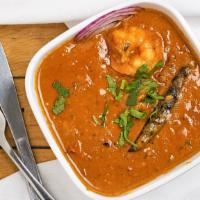 Shrimp Masala (Non-Vegetarian) · Shrimp blended with tangy Indian curry sauce.