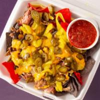 Bbq Nachos · Fresh fried tri-colored chips covered in Pulled Pork, Nacho Cheese, Banana and jalapeño pepp...