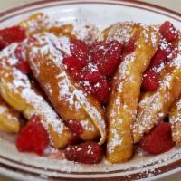French Toast · Most popular. Thick homestyle Texas bread cooked in our signature French toast batter! Toppe...