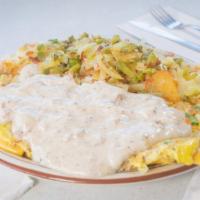 Southern Omelet · Sausage, cheese, onion, green pepper, and sausage gravy. Comes with toast.