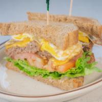 Meat & Egg Sandwich · Choice of bacon (4), sausage links (4), or ham (2).