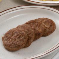 Turkey Sausage Patties · Four country style Jennie-O Turkery Sausage Patties.