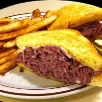 Corned Beef & Swiss Sandwich Combo · Comes with fries and soft drink.