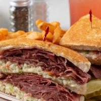 New Yorker Sandwich Combo · Triple decker (3 pieces of grilled choice of bread) corned beef, Swiss and coleslaw. Comes w...