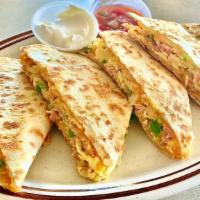 Breakfast Quesadilla · Served with Cheddar cheese and your choice of three items.