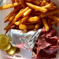 Corned Beef & Swiss Pita Combo · Comes with fries and soft drink.