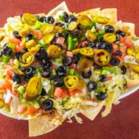 Super Nachos (Large) · Crisp corn chips topped with seasoned ground beef, melted cheese, lettuce, tomatoes, onions,...