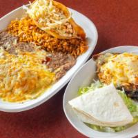 De Puebla Combo · One deep-fried flour taco, one burrito, one chile relleno, with side of rice and beans toppe...