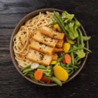 Chili Asian Zing Tofu Mein · Egg noodles paired with tofu infused in our house lemon chili soy sauce and sautéed vegetabl...