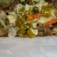 Steak Philly · Steak, Provolone cheese, sauteed  peppers, onions mushrooms, mayo, lettuce, Giardiniera pepp...