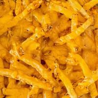 Cheese Fries · Our famous homefries smothered in cheddar cheese.