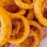 Onion Rings · Thick cut onion slices, double dipped in seasoned beer batter.