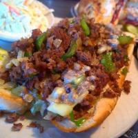 Philly Steak Sandwich · Prime, thinly sliced, Angus beef steak grilled perfect and served on a fresh sub bun w/Swiss...