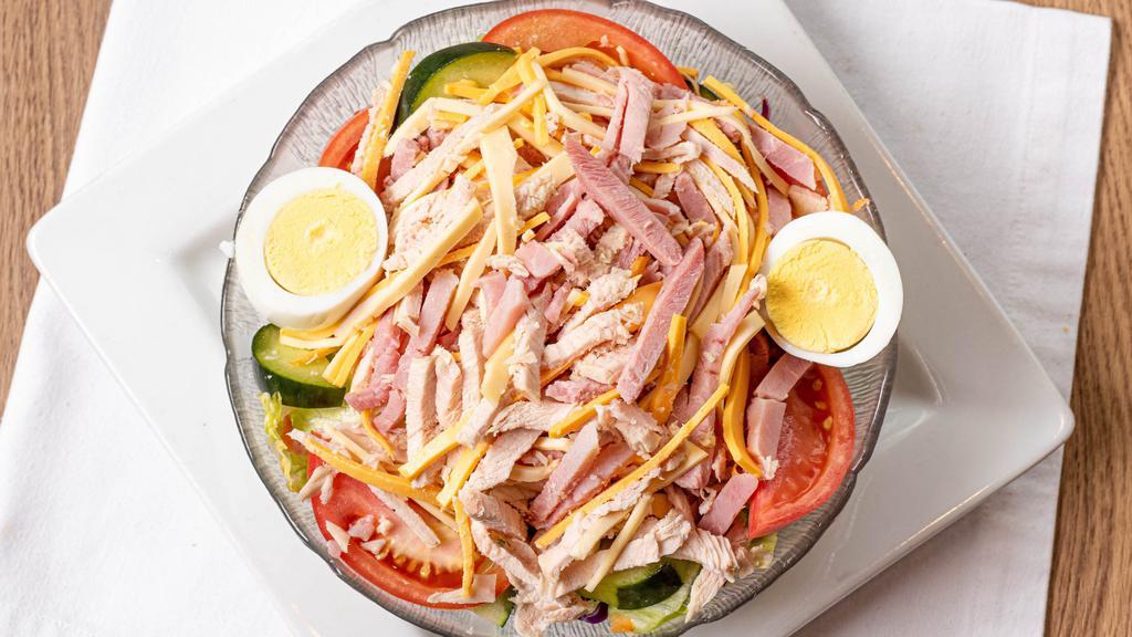 Julienne Salad · Turkey, ham, American Cheese, Swiss cheese, lettuce, tomato, cucumber and hard-boiled egg.