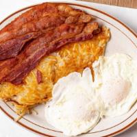Cameo Breakfast · Two eggs, choice of hash browns or American fries or pancakes, choice of four bacon, two ham...