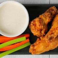 100 Wings · Choose up to 5 flavors and 2 dipping sauces. Carrots and celery included.
