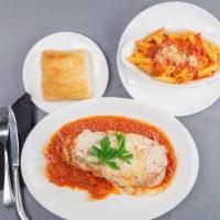 Eggplant Parmigiana · Fresh baked parmesan-breaded eggplant baked in our marinara sauce with mozzarella cheese ser...