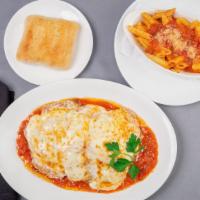 Veal Parmigiana · Lightly breaded veal cutlets baked in our marinara sauce with mozzarella cheese served with ...