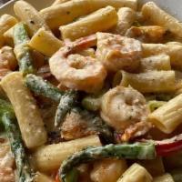 Rigatoni San Marino · Rigatoni pasta tossed with spinach, shrimp, roasted red peppers, asparagus and Alfredo sauce.