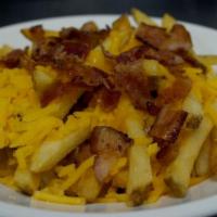 Loaded Fries · Large Order of Fries Topped with Plenty of Cheese and Bacon, Served with Boom-a-rang Ranch