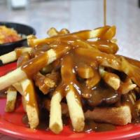 Hot Hamburger Plate · 1/4lb Hamburger Patty on Grilled Texas Toast, Piled High with Fries & Covered with Roast Bee...