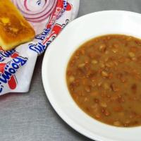 Beans & Cornbread · Bowl of House Made Pinto Beans with a Slice of Corn Bread