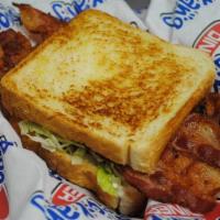 Blt Sandwich · 3 Slices of Bacon, Mayo, Lettuce, Tomato on Grilled Texas Toast