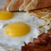 Big Breakfast · 2 Eggs, 3 Slices of Bacon or 2 Sausage Patties, Hash Browns, Toast or Biscuit & Gravy