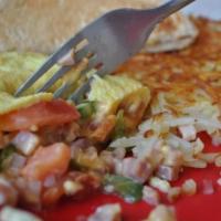 Western Omelette · 3 Egg Omelette with Ham, Onions, Tomatoes, Bell Peppers, Cheese, Hash Browns, Toast or Biscu...