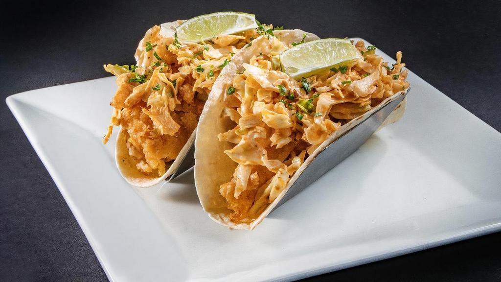 Fried Fish Taco · A 1925 PubHouse Favorite! 2 Hand Battered Cod Tacos, Chipotle and Cilantro Slaw, w/ Lime Wedge.