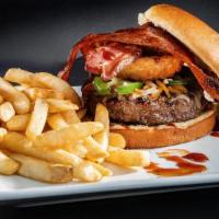 Bbq Western Burger · ½Lb 100% Black Angus Beef Patty Topped with Melted Cheddar Cheese, Thick-Cut Bacon, An Onion...