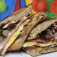 Good Morning Hopkins · Breakfast Sandwich. Multigrain bread, eggs, sausage, American cheese, bacon, ham, chipotle m...